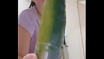 Masturbating With A Cucumber In The Mouth